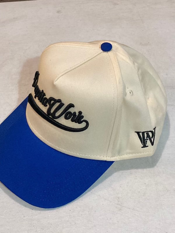 curved white and blue cap