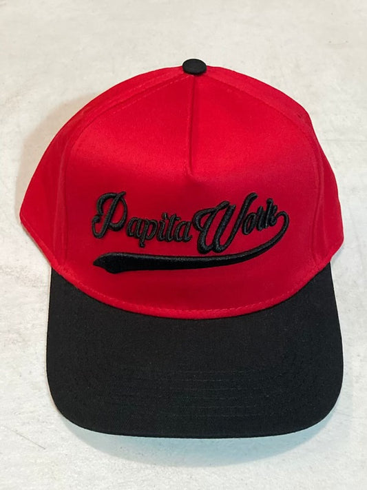 curved red and black visor cap