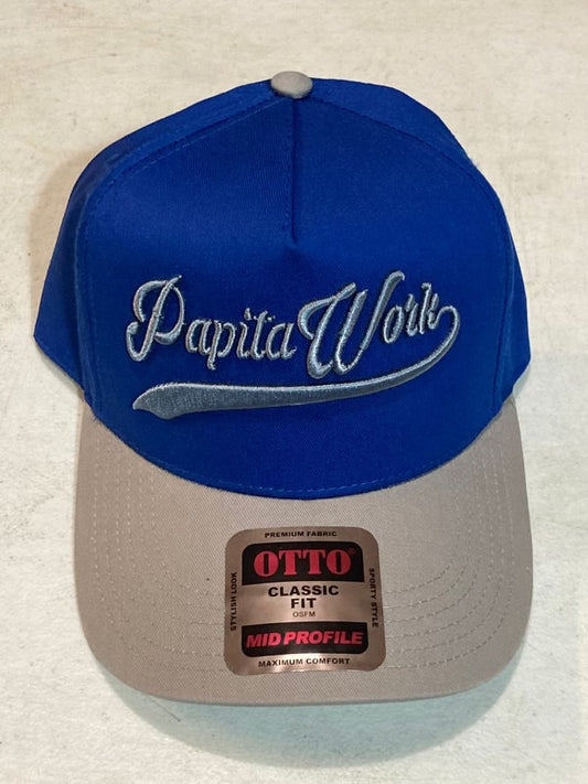 curved blue and tan cap