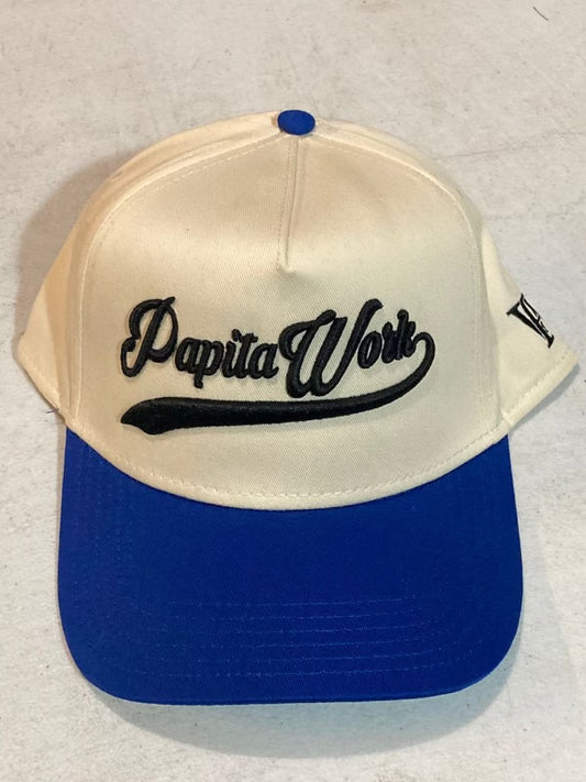 curved white and blue cap