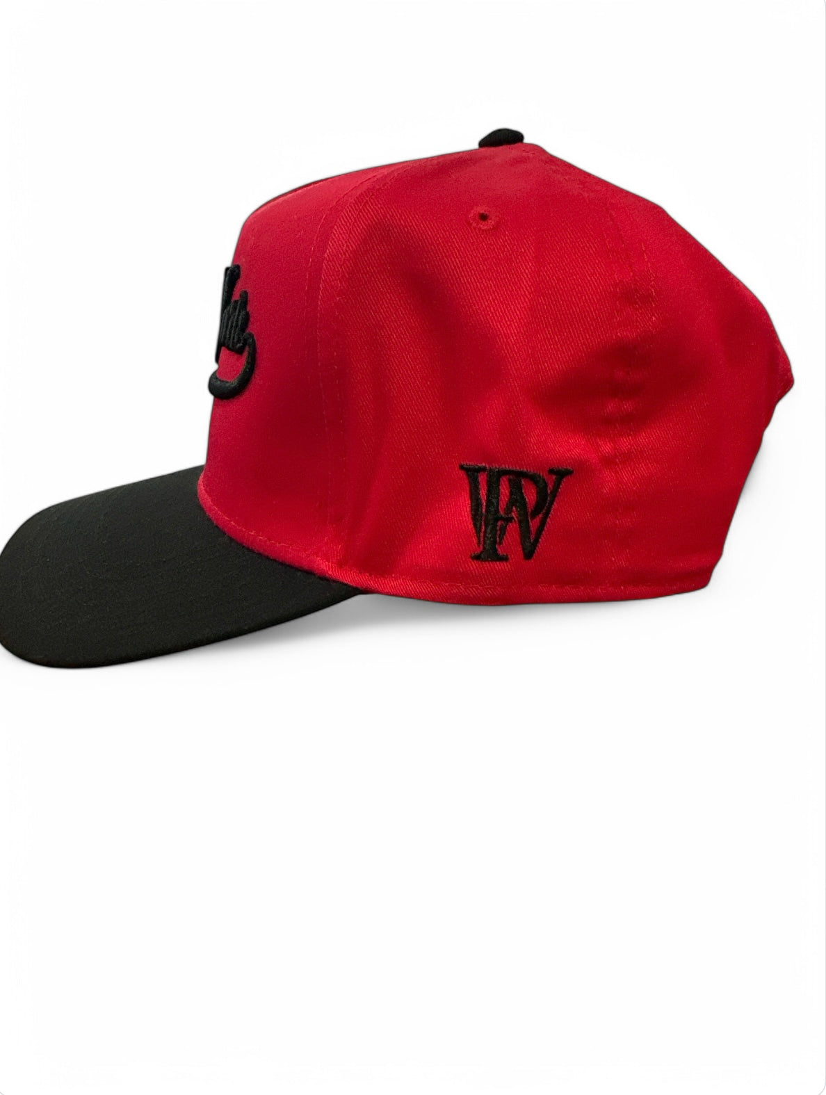 curved red and black visor cap