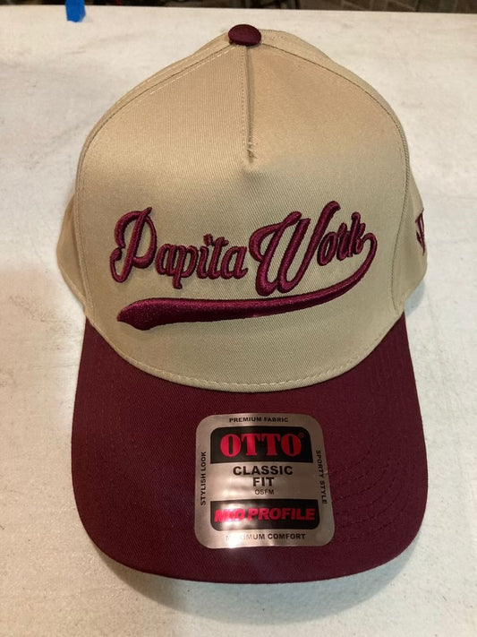 curved tan and maroon cap